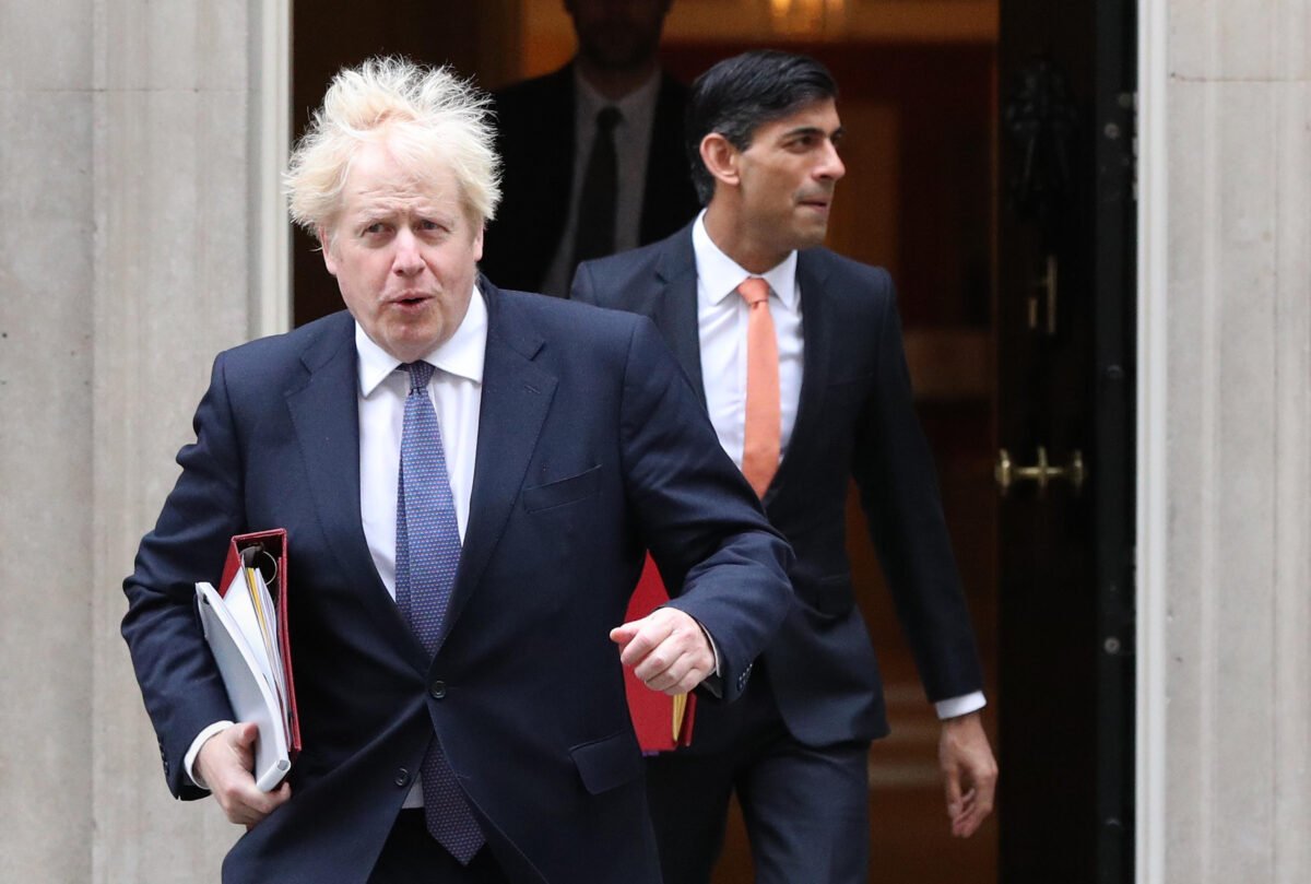 Former Prime Minister Boris Johnson (L) and former Chancellor of the Exchequer Rishi Sunak outside 10 Downing Street, London on Oct. 13, 2020.