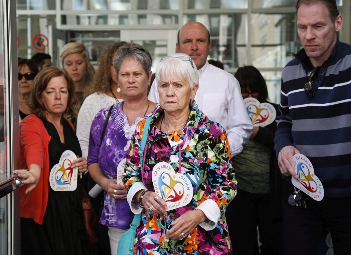 Family members of some of the victims killed by Matthew de Grood leave court in Calgary on May 25, 2016.  (The Canadian Press/Jeff McIntosh)