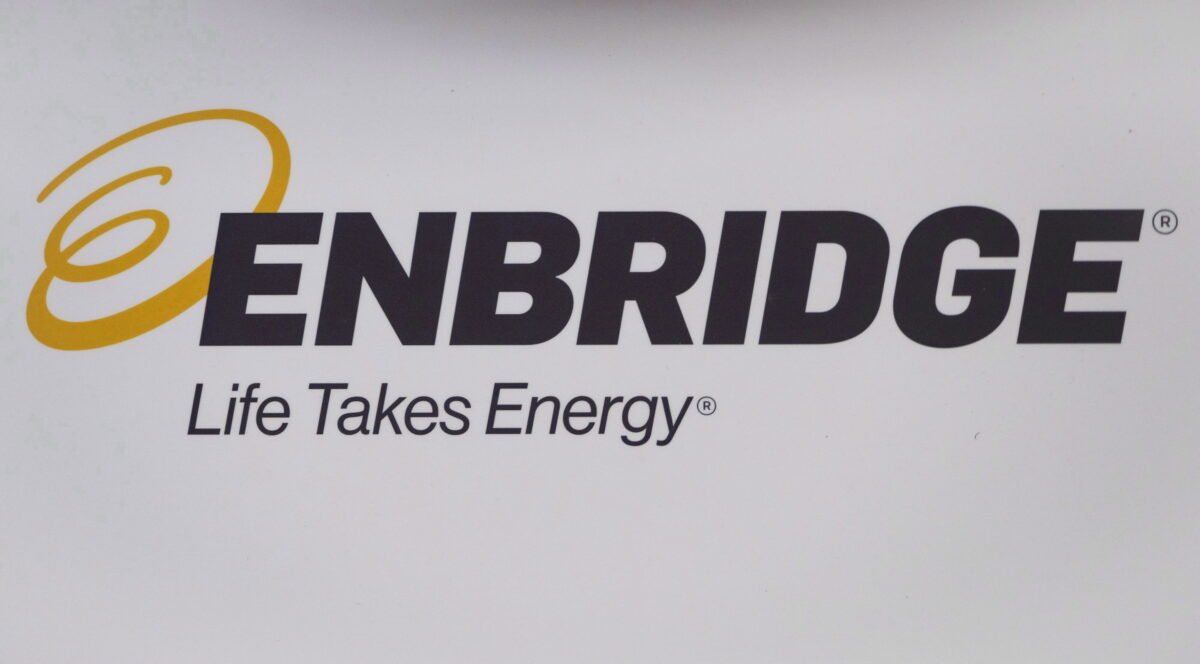 The Enbridge logo is shown at the company's annual meeting in Calgary, Canada, on May 9, 2018. (Jeff McIntosh/The Canadian Press)
