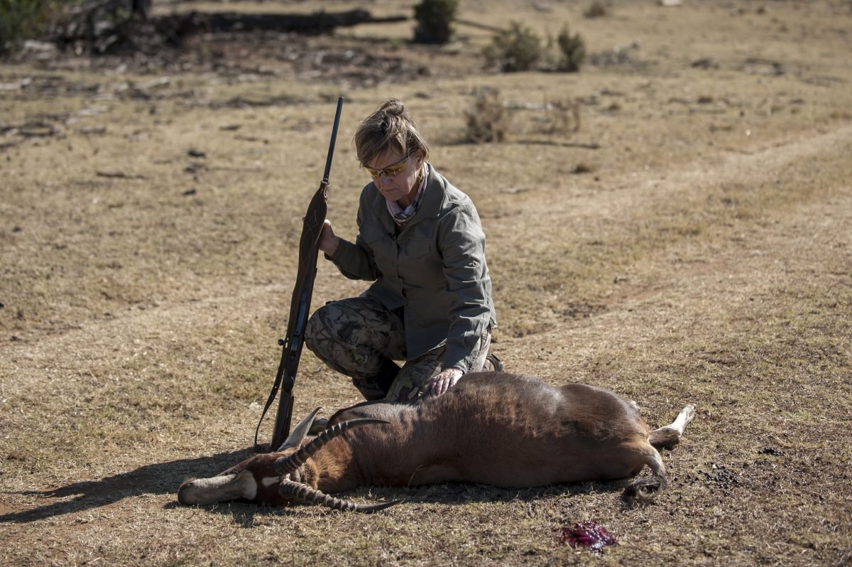Adri Kitshoff, chief executive officer of Professional Hunters' Association of South Africa, by an antelope she hunted at the Iwamanzi Game Reserve in Koster, South Afrika, on June 6, 2015. (Stefan Heunis/AFP/Getty Images)