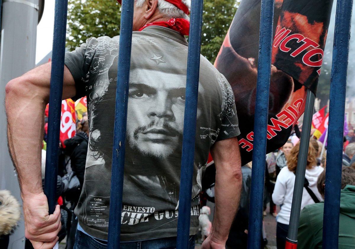 A protester wears a T-shirt with a portrait of Argentinian communist leader Ernesto "Che" Guevara during a protest in front of the Palais de Justice of Amiens on Oct. 19, 2016. (Francois  Nascimben/AFP/Getty Images)