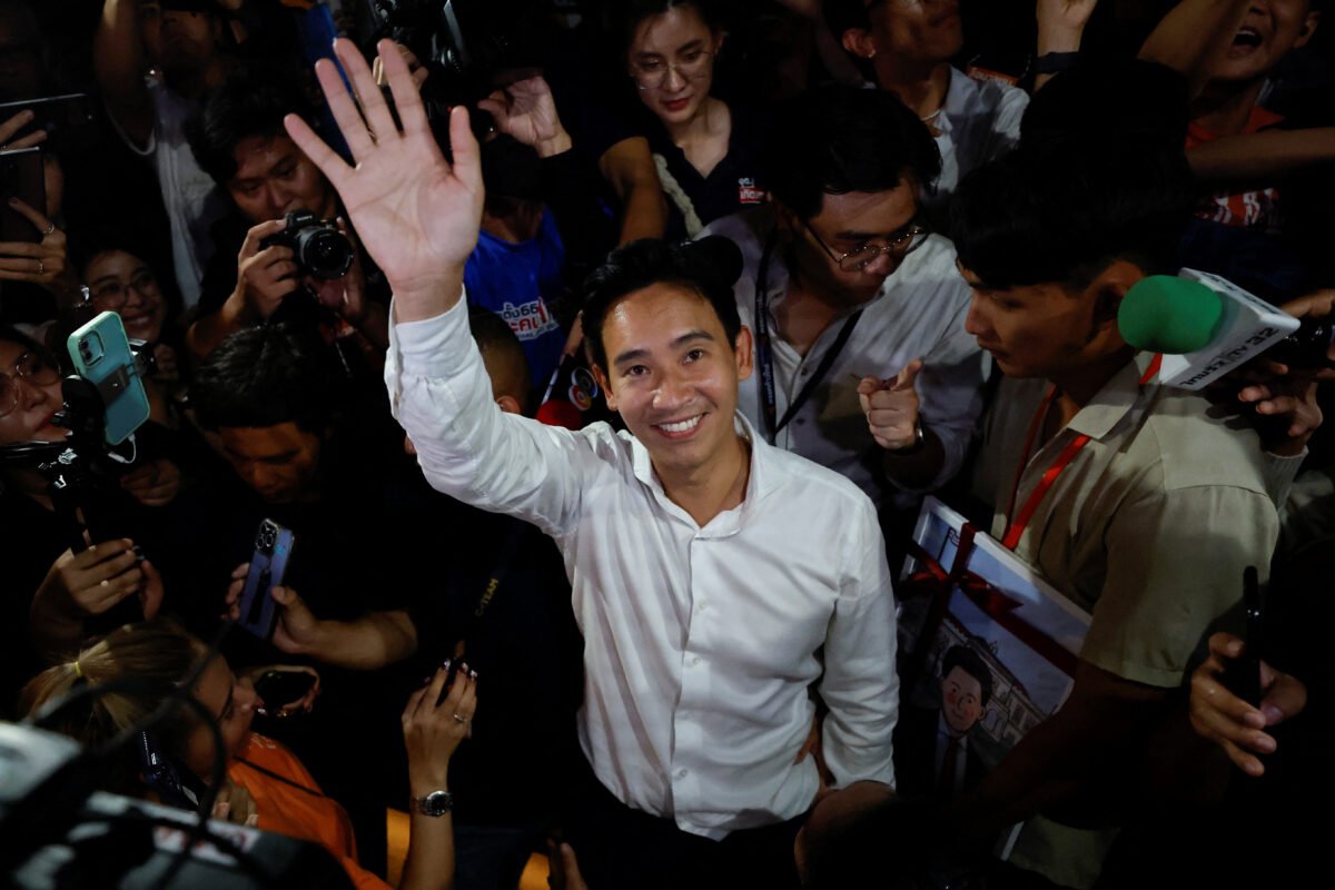 Move Forward Party leader and prime ministerial candidate, Pita Limjaroenrat, waves to the crowd during the general election in Bangkok, Thailand, on May 14, 2023. (Jorge Silva/Reuters)