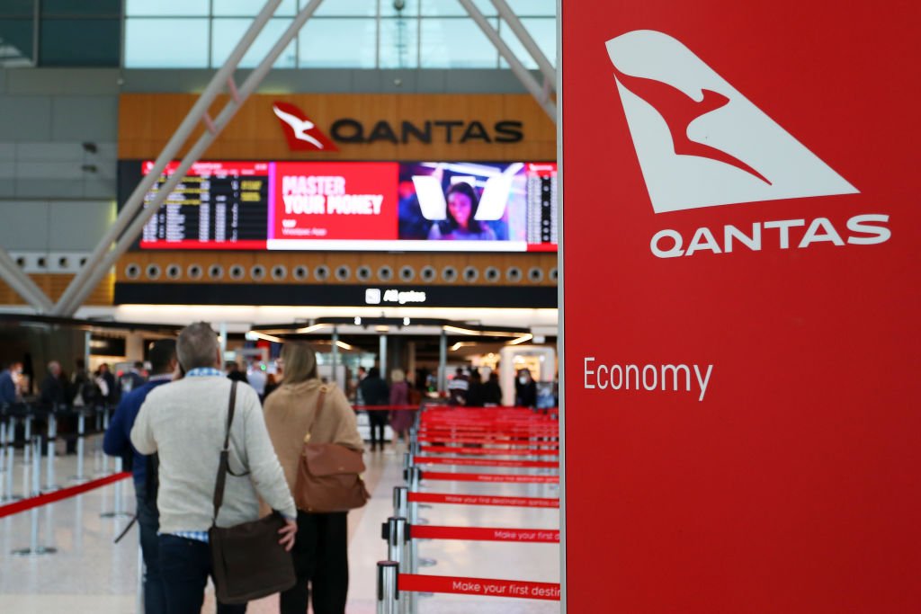 People arrive at the Qantas domestic terminal at Sydney Airport in Sydney, Australia on Aug. 25, 2022. (Photo by Lisa Maree Williams/Getty Images)