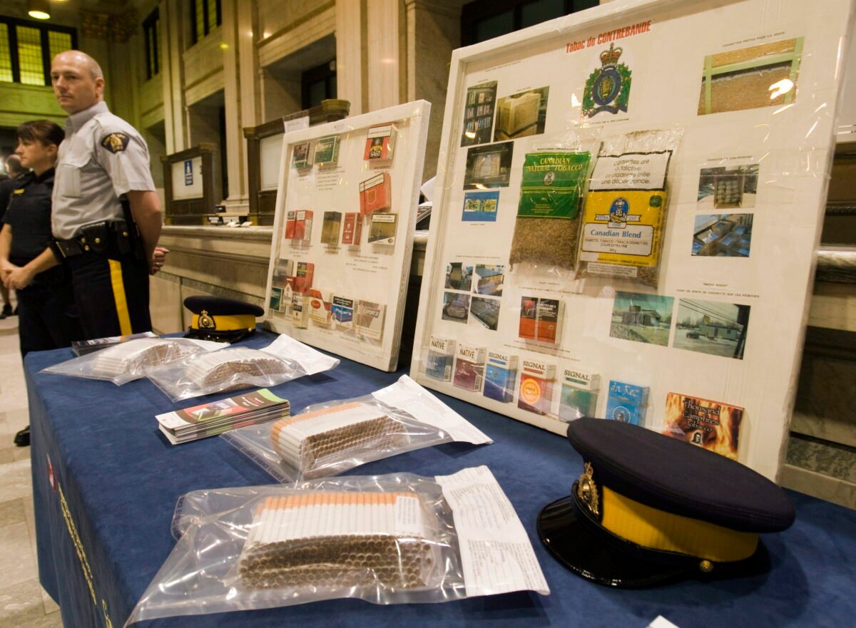 Contraband tobacco is displayed at a news conference where the Canada Border Services Agency announced it would begin using sniffer dogs to combat the illegal tobacco trade in Montreal on May 28, 2010. (Ryan Remiorz/The Canadian Press)