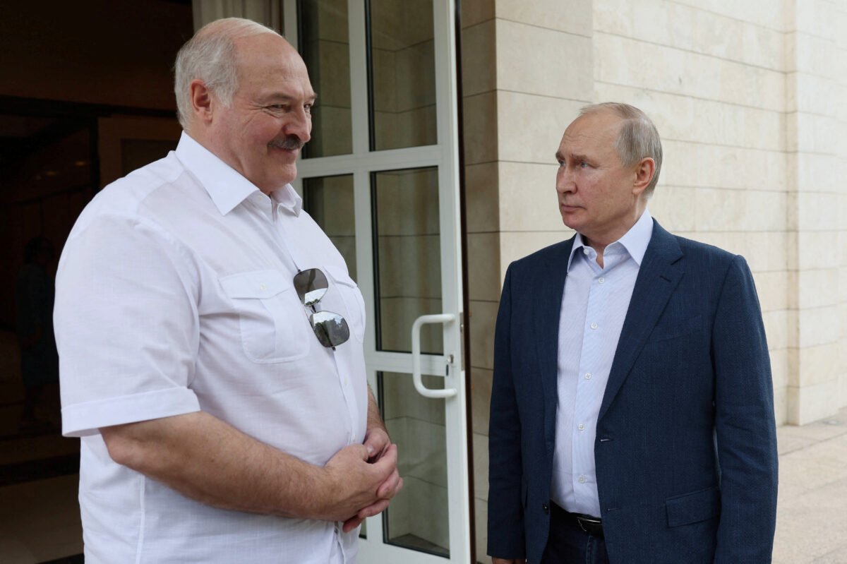 Russian President Vladimir Putin (right) and Belarusian President Alexander Lukashenko speak during a meeting at the Bocharov Ruchei residence in Sochi, Russia, on June 9, 2023. (Sputnik/Gavriil Grigorov/Kremlin via Reuters)