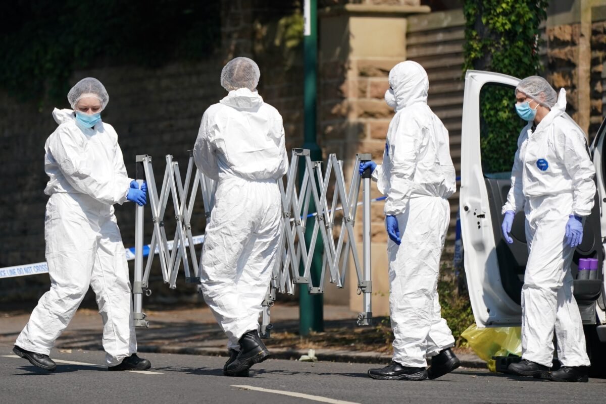Police forensics officers on scene of a deadly attack on Magdala road, Nottingham, on June 13, 2023. (Jacob King/PA Media)
