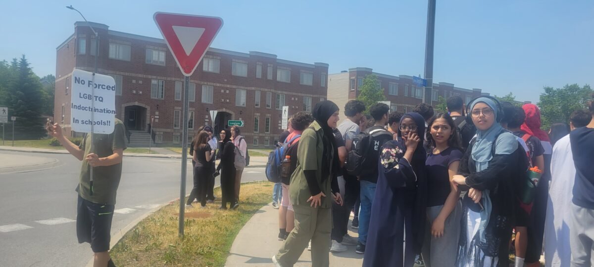 Dozens of students gather at Longfields-Davidson Heights Secondary School to protest against gender ideology in Ottawa on June 15, 2023. (Matthew Horwood/The Epoch Times)