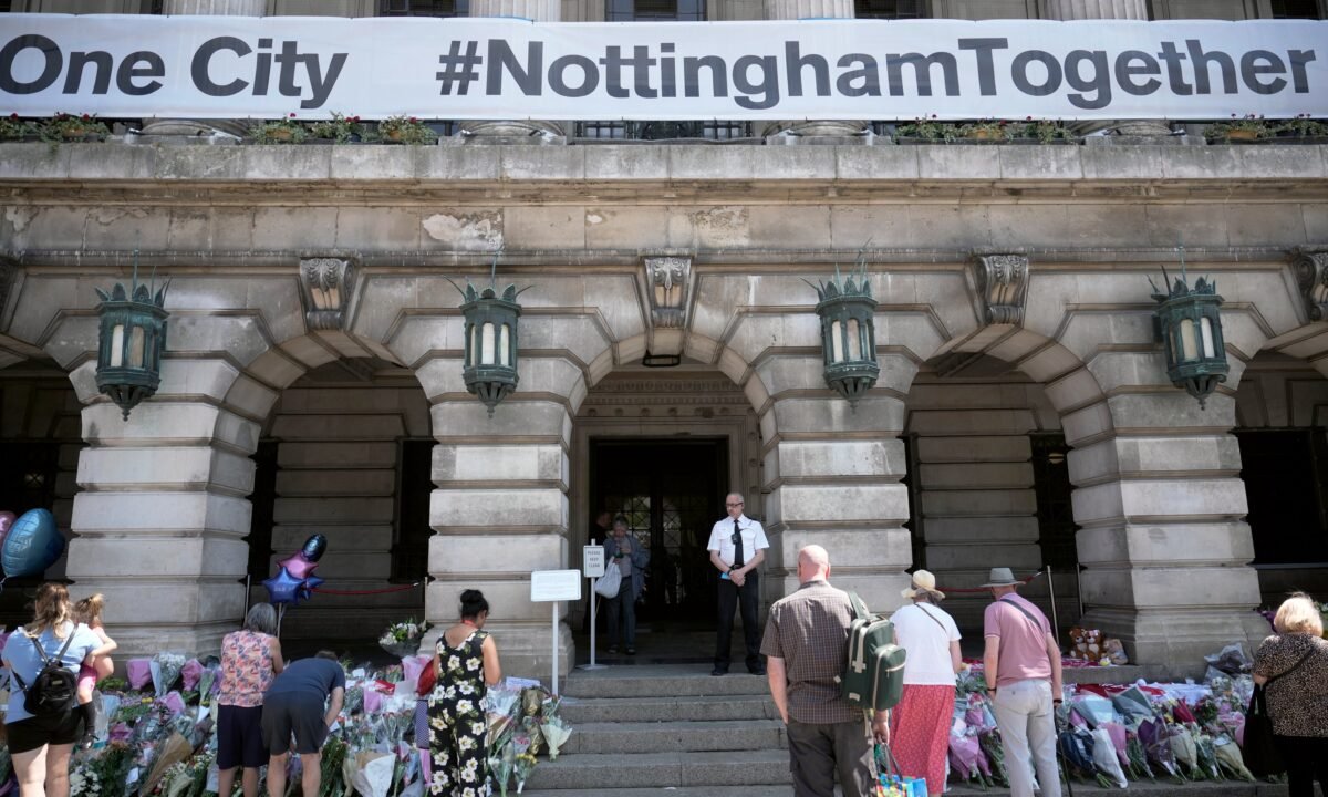Flowers, balloons, and tributes lay on the steps of Nottingham Council House after three people were killed and another three hurt in Tuesday's attacks, in Nottingham, England, on June 16, 2023. (Christopher Furlong/Getty Images)