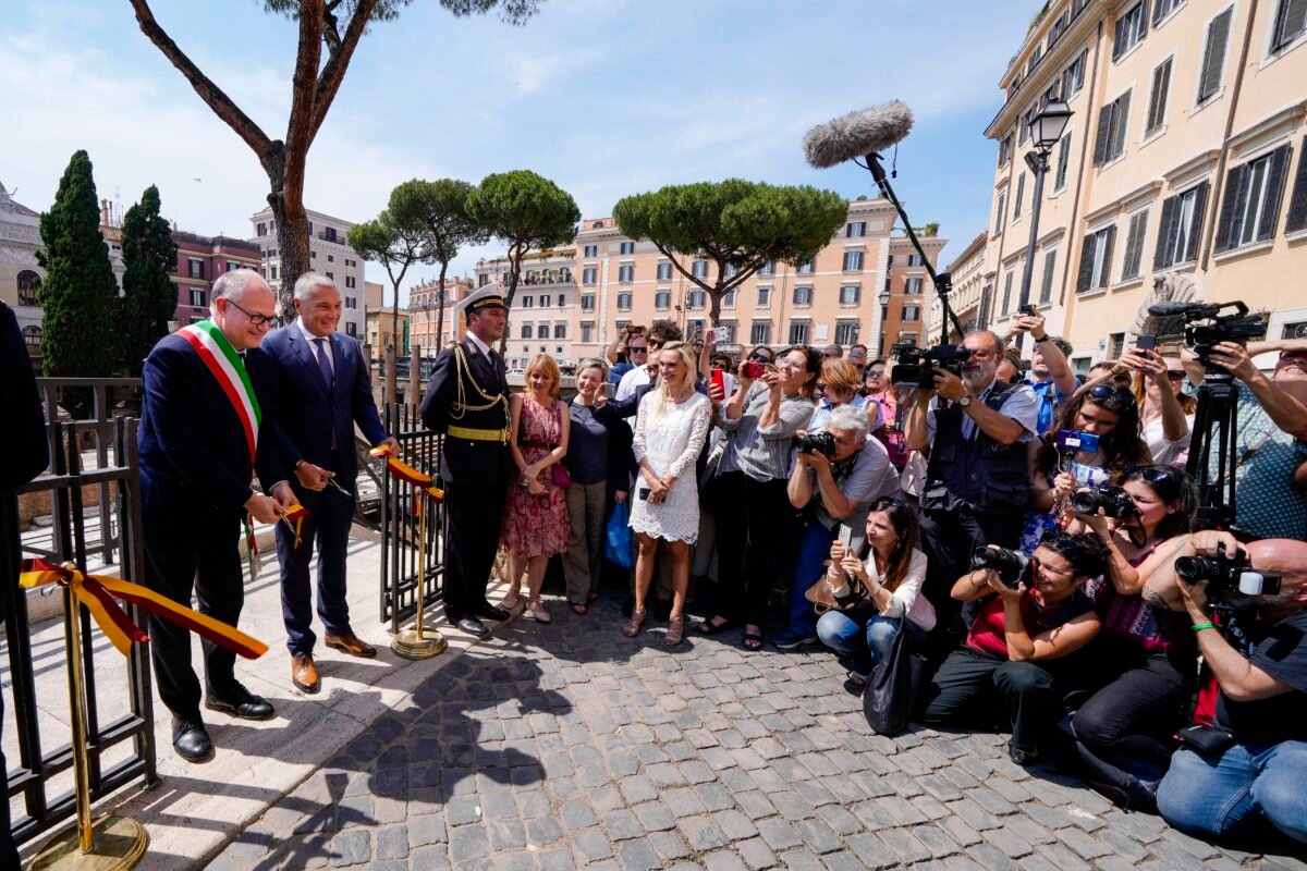 Rome's Mayor Roberto Gualtieri (L) and Bulgari CEO Jean-Christophe Babin cut the ribbon to inaugurate the walkways and nighttime illumination of the so called "Sacred Area" where four temples, dating back as far as the 3rd century B.C., stand smack in the middle of one of modern Rome's busiest crossroads on June 19, 2023. (Domenico Stinellis/AP Photo)