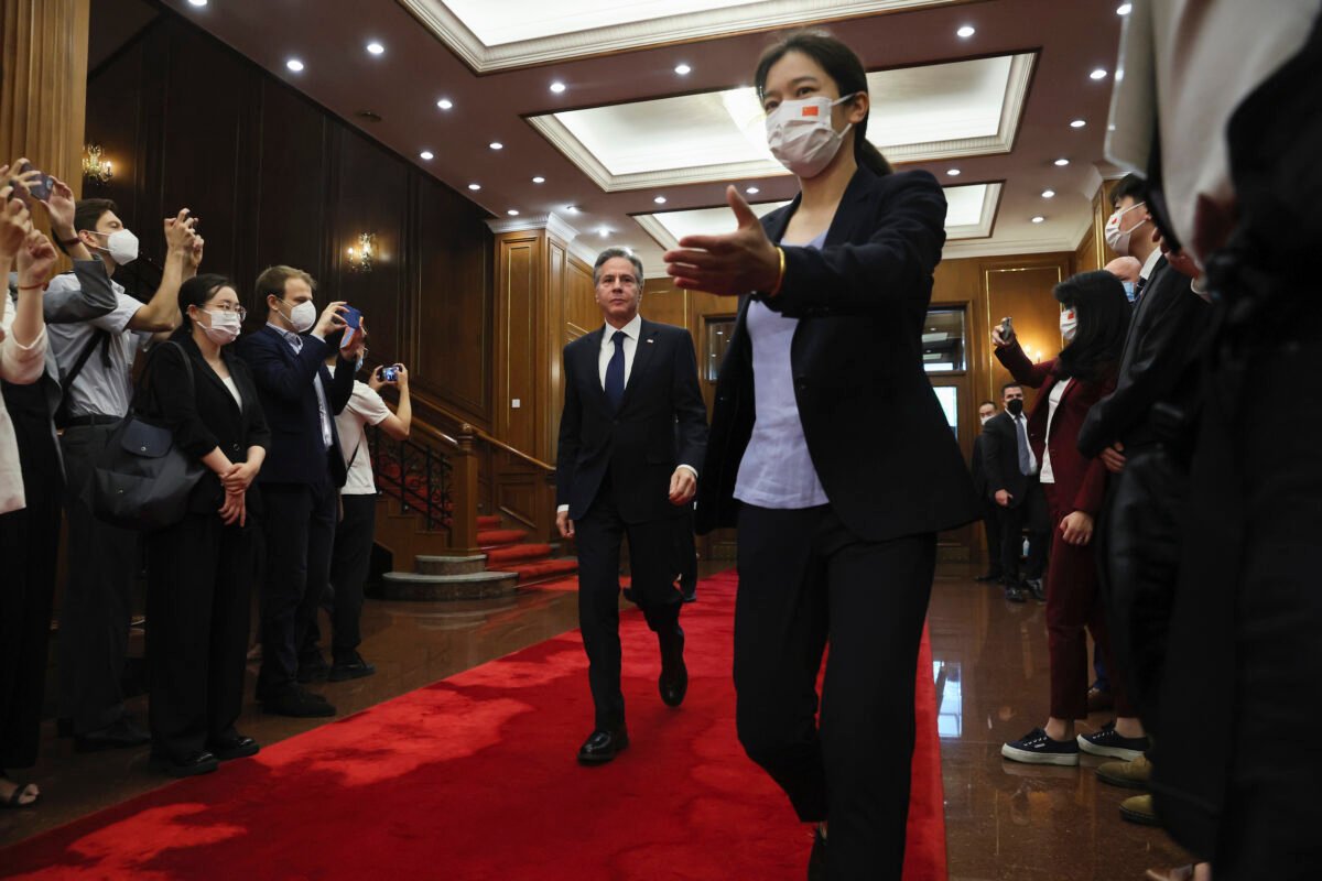 U.S. Secretary of State Antony Blinken (C) walks as he arrives to meet with China's top diplomat Wang Yi (not in photo) at the Diaoyutai State Guesthouse in Beijing, China, on June 19, 2023. (Leah Millis/Pool Photo via AP)