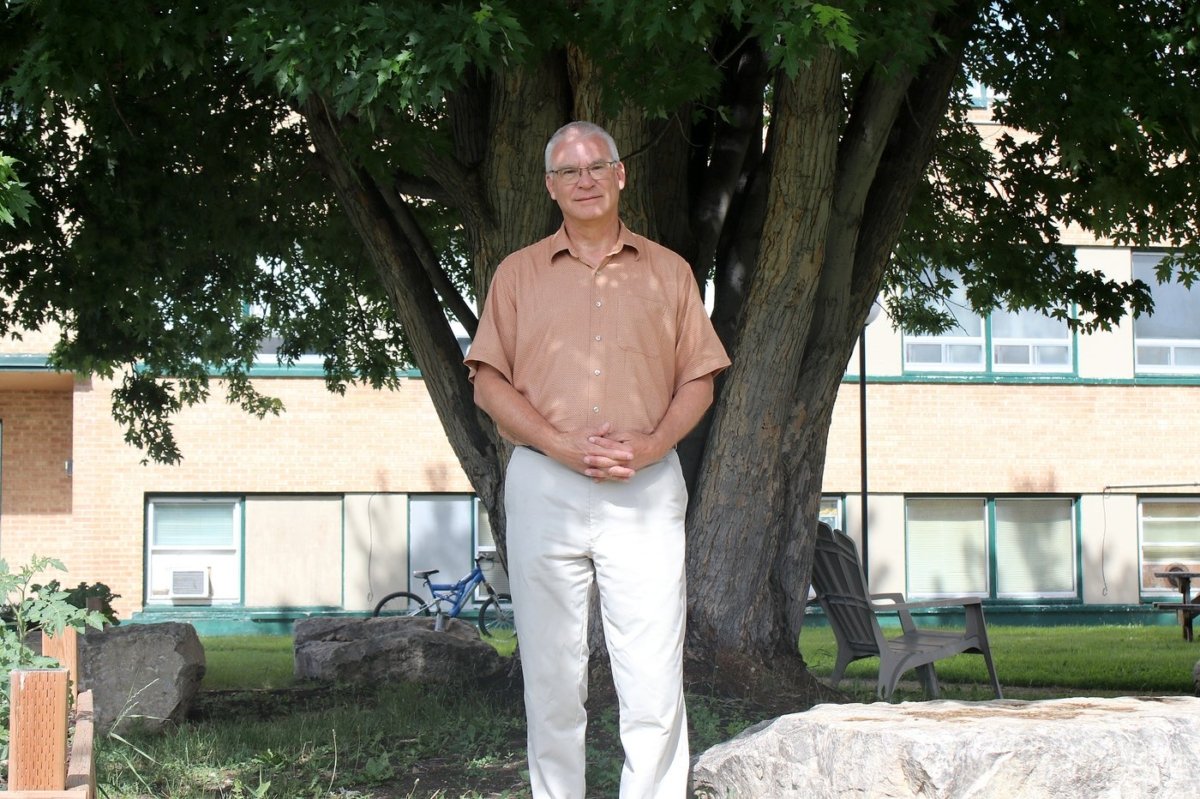 Wayne Olson, a community minister for the Church of Christ in Dauphin, stands outside Parkland Crossing in Dauphin, Man., on June 21, 2023. (The Canadian Press/Kelly Geraldine Malone)