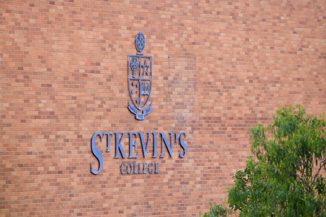 Signage is seen at St Kevin's College in Toorak, Melbourne, Australia on Feb. 20, 2020. (AAP Image/Erik Anderson)