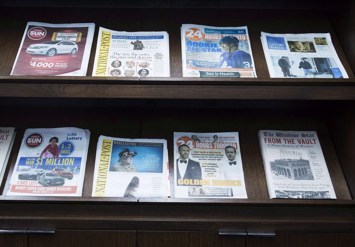 Postmedia newspapers on display during the company's annual general meeting in Toronto on January 12, 2017. (The Canadian Press/Nathan Denette)