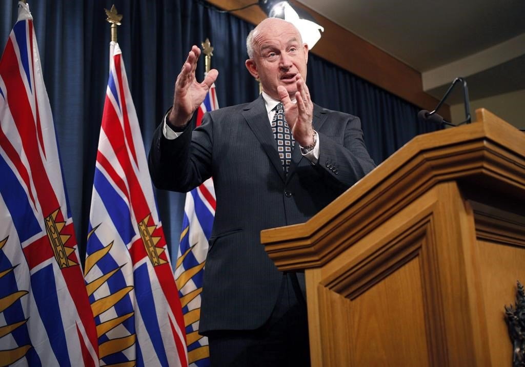 Minister of Public Safety and Solicitor General Mike Farnworth speaks to media at the Legislature in Victoria, B.C., on February 5, 2018. (The Canadian Press/Chad Hipolito)