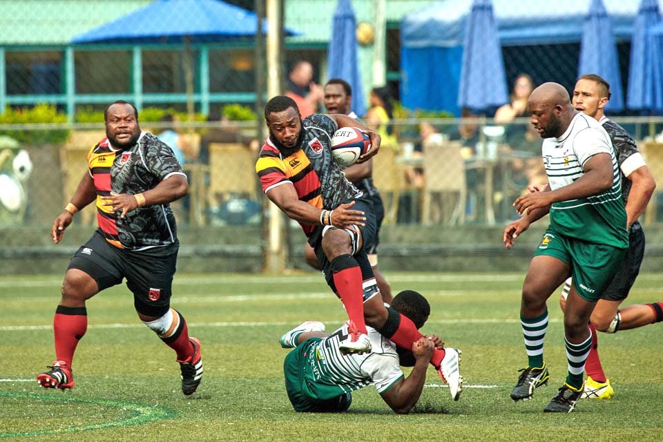 Papua New Guinea forwards try to make a break in their Cup of Nations match against Zimbabwe at HKFC on Saturday Nov 19, 2016. (Dan Marchant)