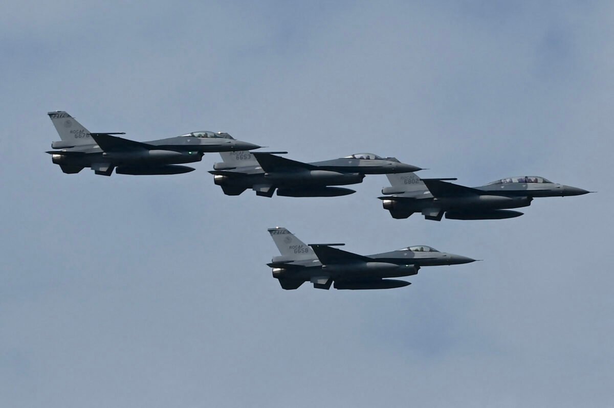 Four upgraded U.S.-made F-16 V fighters are seen in a file photo. (Sam Yeh/AFP via Getty Images)