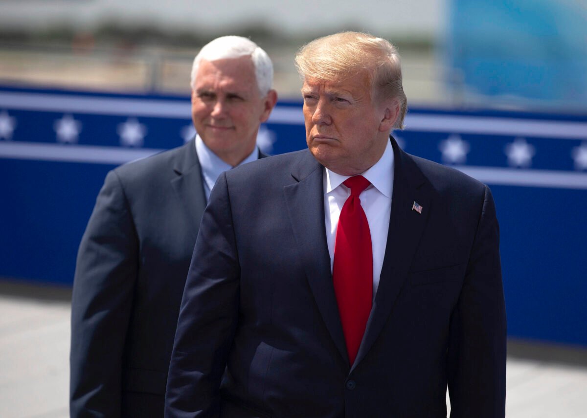 President Donald Trump, (R), and Vice President Mike Pence wait on the rooftop of the Operational Building at NASA before the launch of the SpaceX Falcon 9 rocket in Cape Canaveral, Fla., on May 30, 2020. (Saul Martinez/Getty Images)