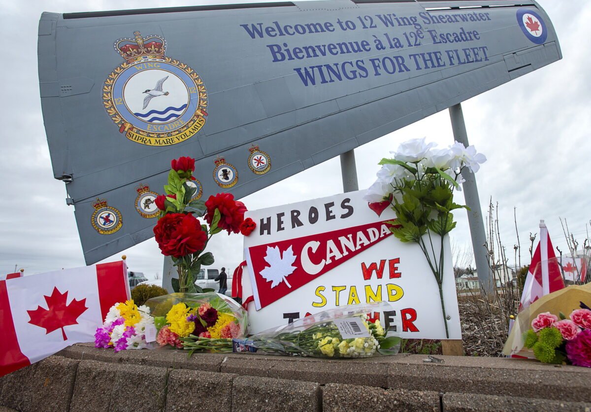 A memorial pays respect to the victims of a military helicopter crash, at 12 Wing Shearwater in Dartmouth, N.S., home of 423 Maritime Helicopter Squadron, Canada, on May 1, 2020. (Andrew Vaughan/The Canadian Press)