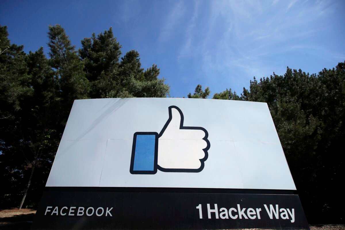 Re thumbs up Like logo is shown on a sign at Facebook headquarters in Menlo Park, Calif., on April 14, 2020. (Jeff Chiu/AP Photo)