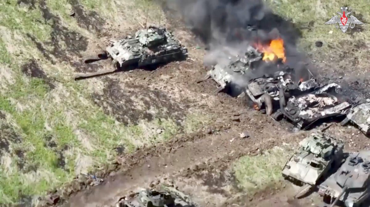 A still image from a video shows what are said to be destroyed armored vehicles of the Ukrainian armed forces, in the course of the Russia-Ukraine conflict in an unidentified location in the southern Donetsk region in Ukraine, in this image taken from a handout footage released on June 10, 2023. (Russian Defense Ministry via Reuters)