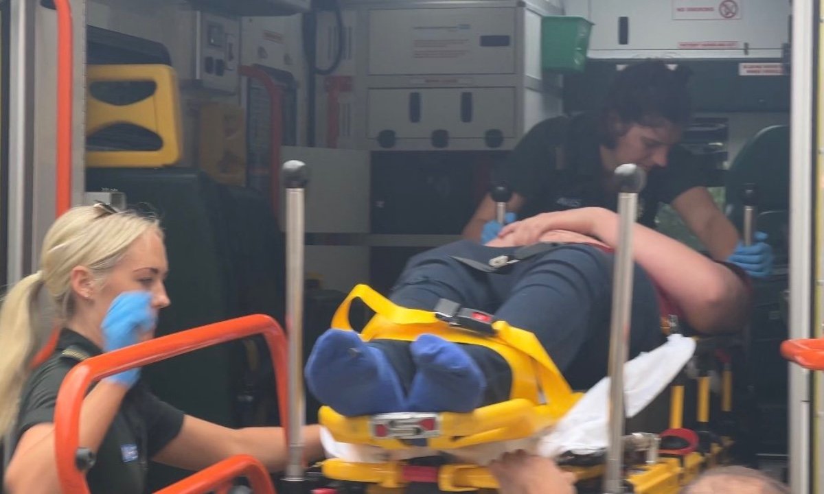 An 18-year-old member of Conservative student group Turning Point UK was attacked during a Marxism event in central London on July 1, 2023. The young is pictured being taken away in an ambulance. (Screenshot/Turning Point UK)