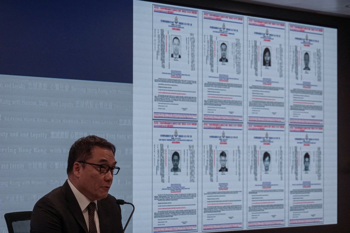 Chief Superintendent of Police (National Security) Li Kwai-wah speaks during a press conference to issue arrest warrants for eight activists in Hong Kong on July 3, 2023. (Joyce Zhou/Reuters)