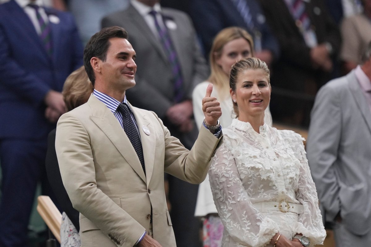 Roger Federer in the Royal Box, next to his wife Mirka Federer (R), is honored at Centre Court ahead of play on day two of the Wimbledon tennis championships in London on July 4, 2023. (Alberto Pezzali/AP Photo)