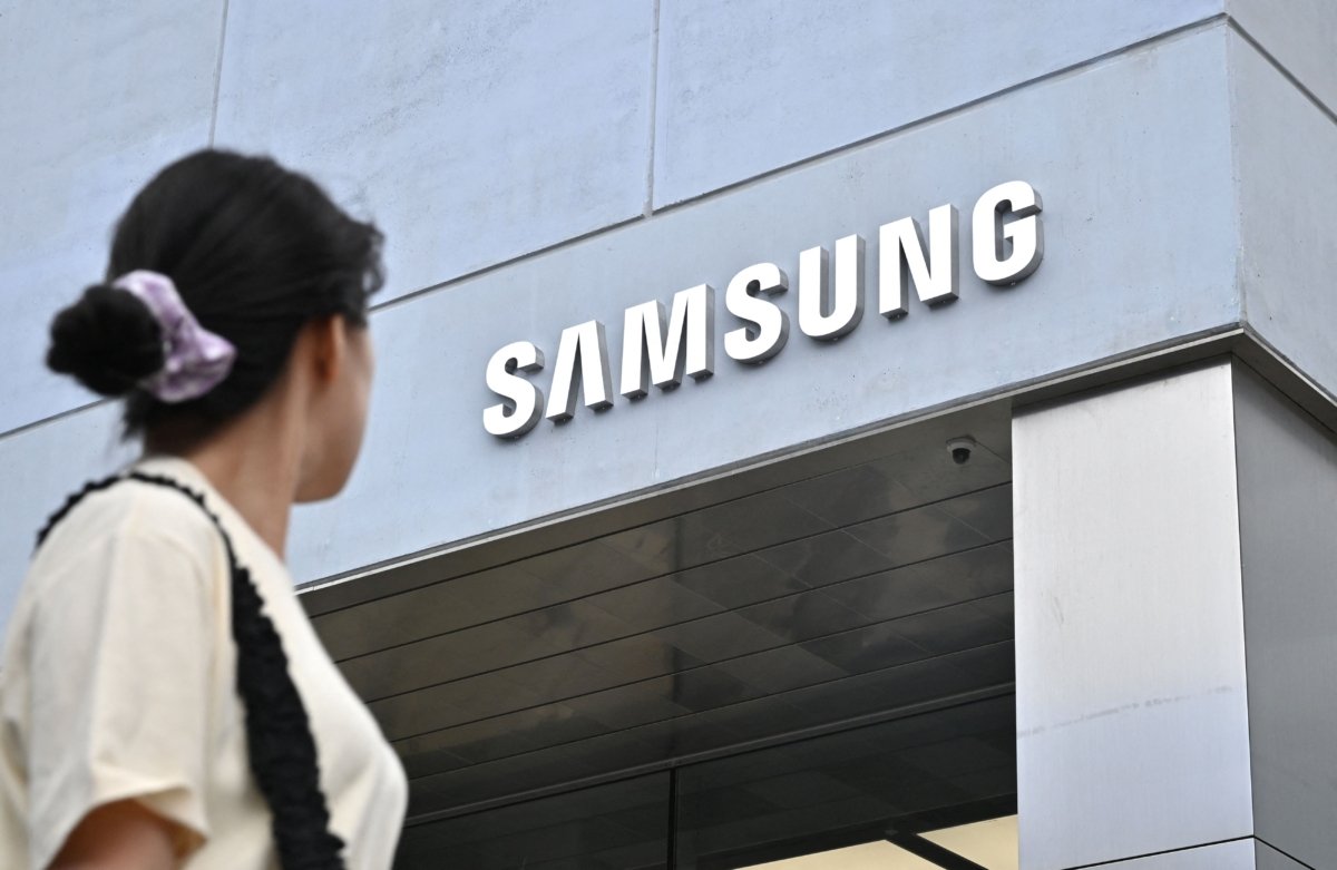 A woman walks past a new flagship store of Samsung Electronics at the Gangnam district in Seoul on June 28, 2023. (Jung Yeon-je / AFP via Getty Images)