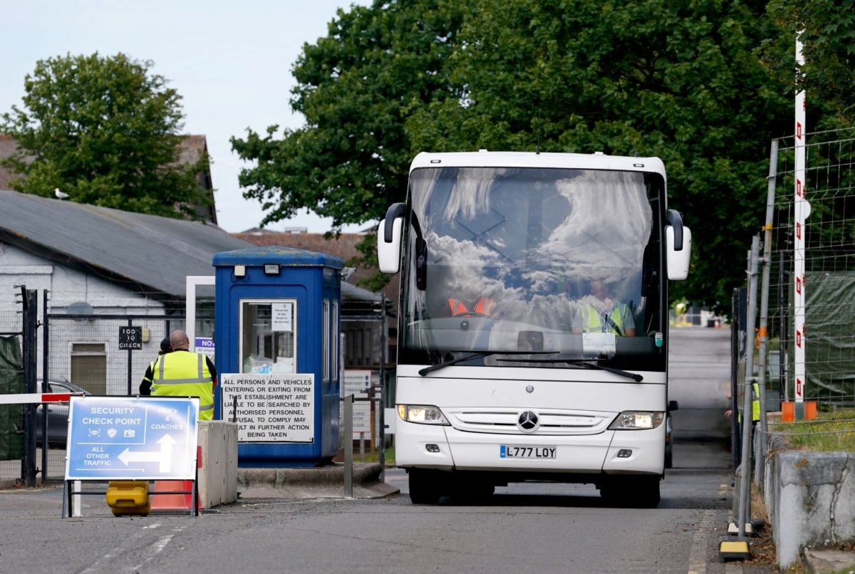A coach with migrants onboard, leaves Manston immigration short-term holding facility in Manston, Kent, on July 10, 2023. (PA)