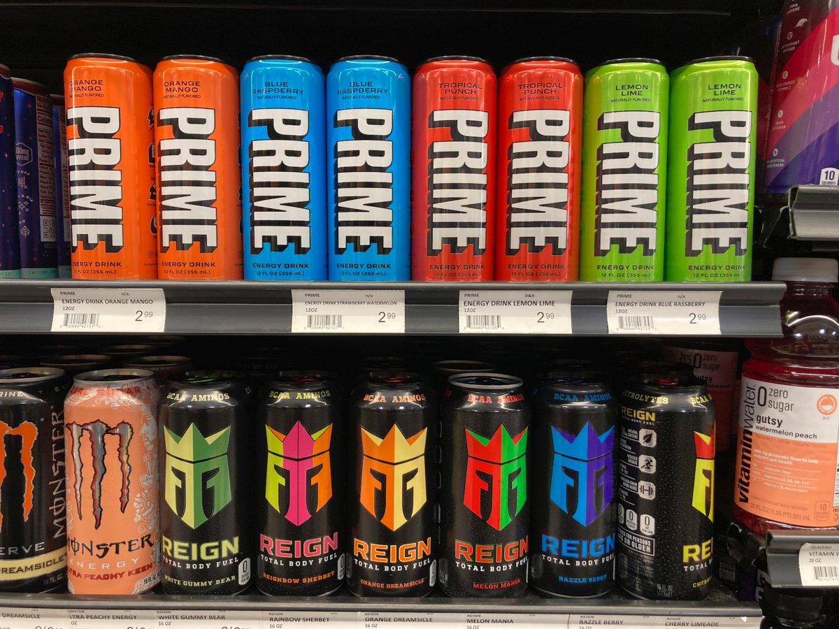 Prime energy drinks are displayed with other energy drinks at a grocery store in Detroit, March 24, 2023. (AP Photo/Carlos Osorio)