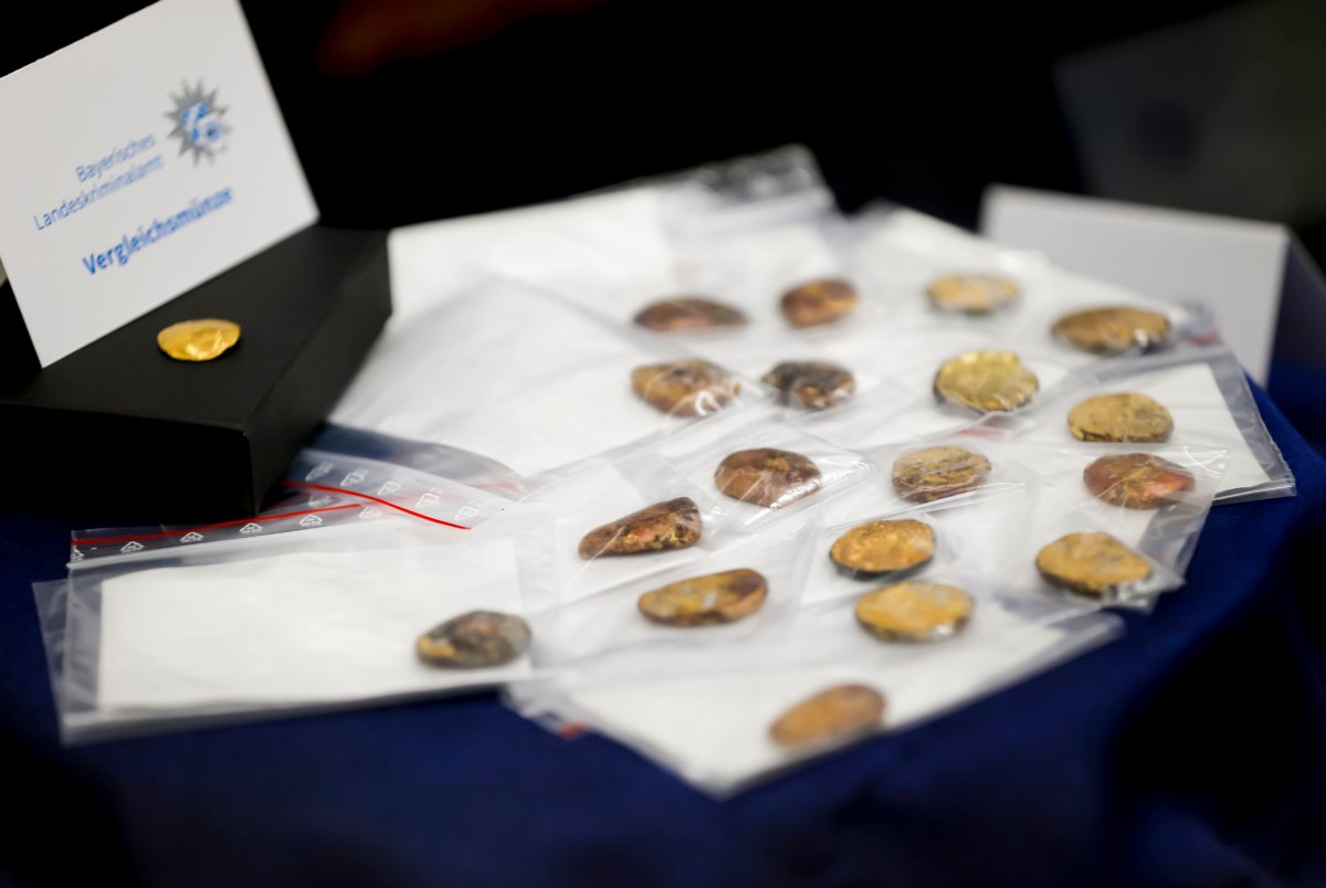 Comparison coins are presented during a press conference held by the Bavarian State Criminal Police Office and the Munich Public Prosecutor's Office on the arrests in the Manching gold treasure theft case in Munich on July 20, 2023. (Uwe Lein/dpa via AP)