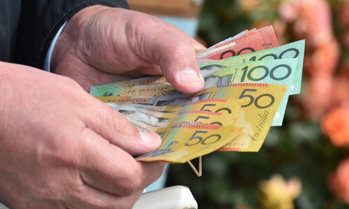 Consumers Tipped to Stash Tax-Cut Savings for Rainy Day