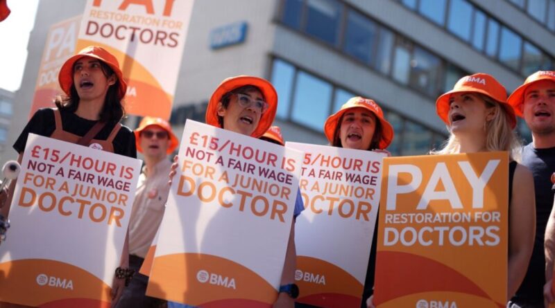 Co-chairmen of the BMA's Junior Doctors Committee Dr. Vivek Trivedi (left) and Dr. Robert Laurenson (right) speaking to the media outside the Department Of Health and Social Care, in London, on March 2, 2023. (PA Wire/PA Images)