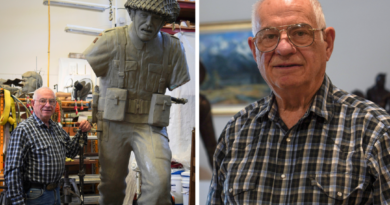 Bronze sculptor Don Begg at Studio West's workshop in Cochrane, Alta., on Nov. 22, 2024. Next to him is a clay version of a sculpture he carved of a Regina Rifles soldier to commemorate the 80th anniversary of D-Day. The original bronze sculpture is on display in France. (Carolina Avendano/The Epoch Times)