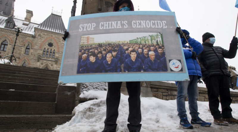 Uyghur Rights Advocacy Project executive director Mehmet Tohti speaks during a news conference in Ottawa on Feb. 1, 2023. (The Canadian Press/Adrian Wyld)